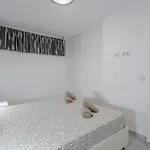 Un En Playa De Americas Адехе